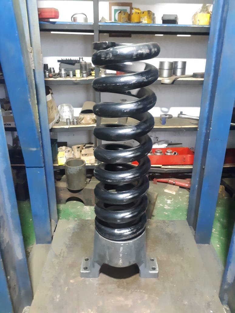 Tensor de oruga reparado